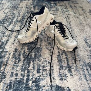 On Running Athletic Shoes in White and Black
